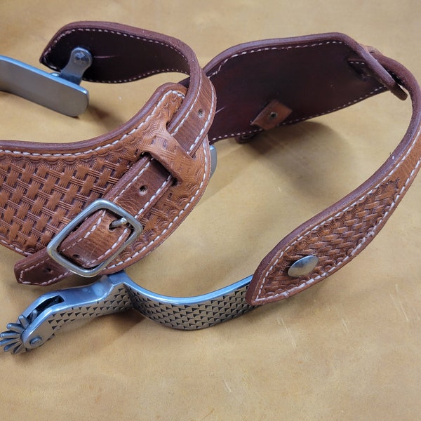 Custom hand made lined spur straps.