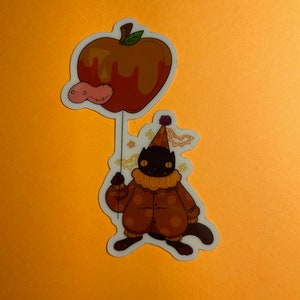 Glow in the dark clown cat sticker