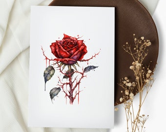 Puede incluir: Una pintura de acuarela de una sola rosa roja con espinas y sangre goteando. La rosa está rodeada de hojas verdes y se coloca sobre un fondo blanco.