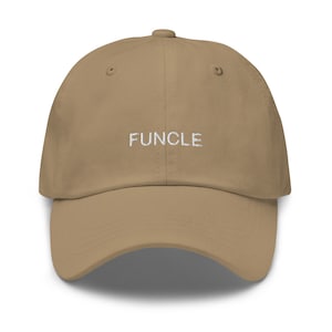 May include: A khaki dad hat with white embroidered text that reads "FUNCLE".