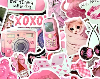 May include: A collection of assorted pink-themed stickers featuring various illustrations including a pink camera, a cat wrapped in a blanket, a rotary phone, dice, lips, cherries, and text such as PLEASE DO NOT TALK TO ME and everything will be okay.