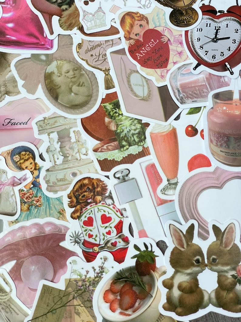 May include: A collection of vintage-style stickers featuring various designs, including a pink heart with the text "Be An Angel", a red and white cowboy boot with a puppy inside, a pink and white carousel, a pink heart-shaped frame, a brown rabbit, a pink perfume bottle, and a pink and white floral design.