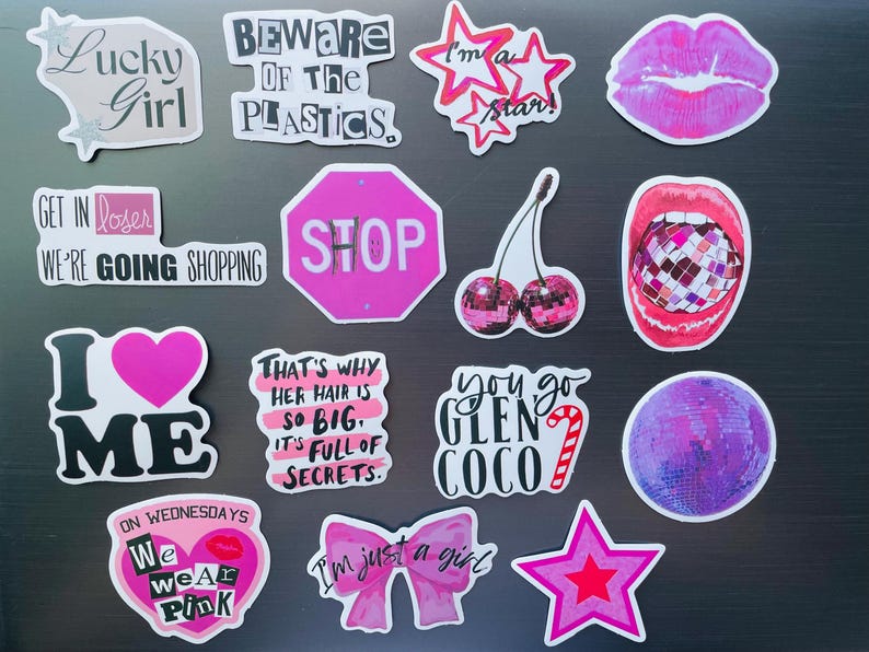 May include: A collection of colorful stickers with various designs and text. The stickers include phrases like "Lucky Girl," "I'm a star," and "We wear pink." Other designs feature lips, cherries, and a disco ball.