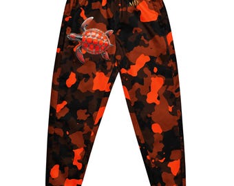 Master Division Jogginghose mit Allover-Print von Meeresschildkröten in Schwarzkoralle, Luxus-Streetwear-Hose mit Camouflage-Muster in Schwarzkoralle und Orange.