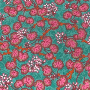 May include: Teal fabric with a repeating pattern of pink leaves and white flowers. The leaves have a darker pink outline.