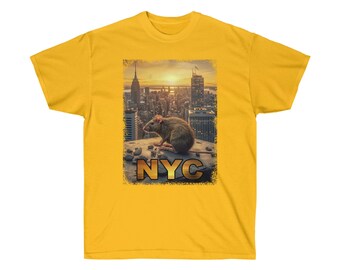 May include: Mustard yellow t-shirt featuring a graphic of a rat on a rooftop overlooking the New York City skyline at sunset. The word "NYC" is printed in gold letters below the image.