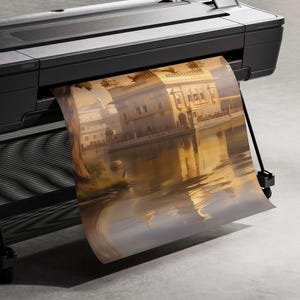 May include: A large format printer with a roll of paper feeding through it. The paper has a printed image of a building reflected in water.