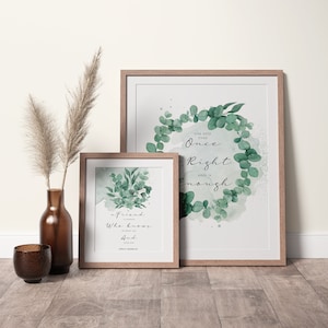 May include: Two framed art prints with botanical designs and inspirational quotes. One print features a eucalyptus wreath and the words "You only live once, Right is enough." The other print has a floral arrangement and a quote about friendship.