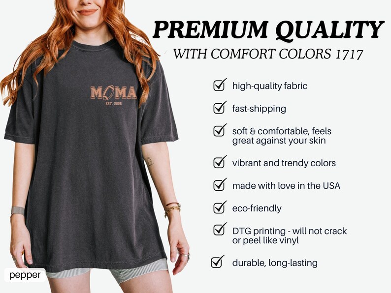 May include: A black t-shirt with the text "MOMA EST. 2005" printed on the front. The shirt is made with high-quality fabric and is eco-friendly. It is also durable and long-lasting.