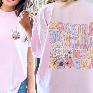 in_my_pickleball_mom_era_comfort_colors_tshirt_blossom