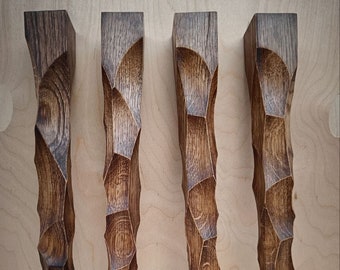 Set van 4 eikenhouten meubelpoten met harde olie- en wasafwerking.