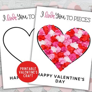 以下が含まれることがあります： ハートをテーマにした2枚のバレンタインデーカード。1枚のカードには黒いハートの輪郭があり、もう1枚は赤、ピンク、白の紙片で埋められています。「I love you to pieces」と「Happy Valentine's Day」の文字が含まれています。