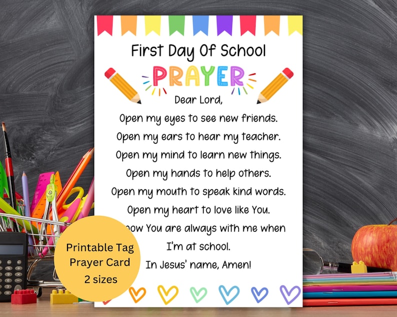 May include: A printable prayer card for the first day of school. The card features the text "First Day Of School PRAYER" with a pencil graphic on each side. The prayer includes lines about seeing new friends, hearing the teacher, and learning new things.