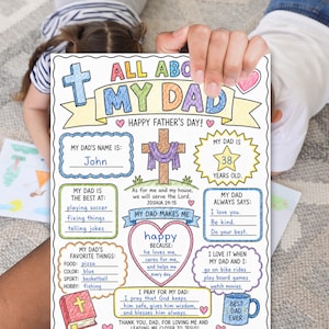 May include: A Father's Day colouring page with the title "All About My Dad." The page has spaces to fill in information about the dad, including his name, age, favourite things, and what he always says. The page is held by a person.