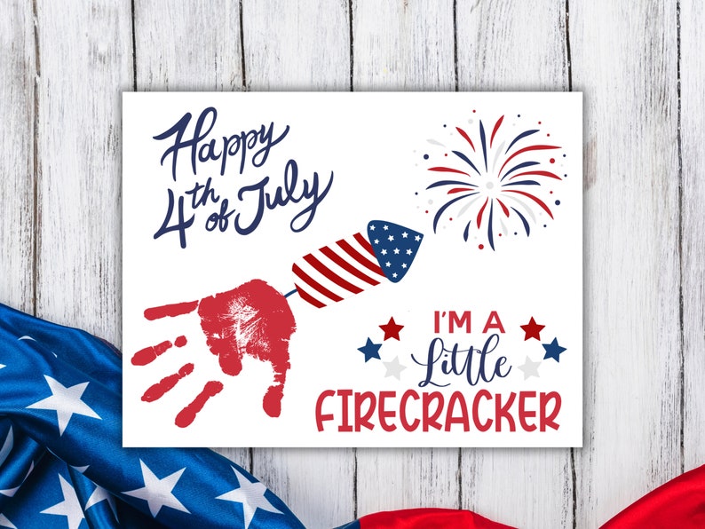May include: A white card with red, white and blue handprint art. The card says "Happy 4th of July" and "I'm a Little Firecracker".