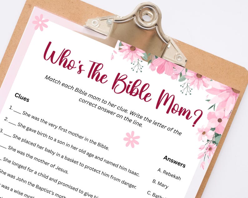 May include: A printable game with pink flowers and green leaves on a white background. The game is called "Who's The Bible Mom?" and asks players to match Bible mothers to their clues.