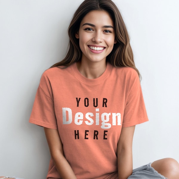 Comfort Colors 1717 Style Neon Cantaloupe Heavyweight Adult Tee Womens T-Shirt Mockup with Shadows Layer Young Adult Hispanic Female