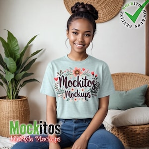 May include: A woman wearing a light blue t-shirt with a floral design and the text "Mockitos Mockups".