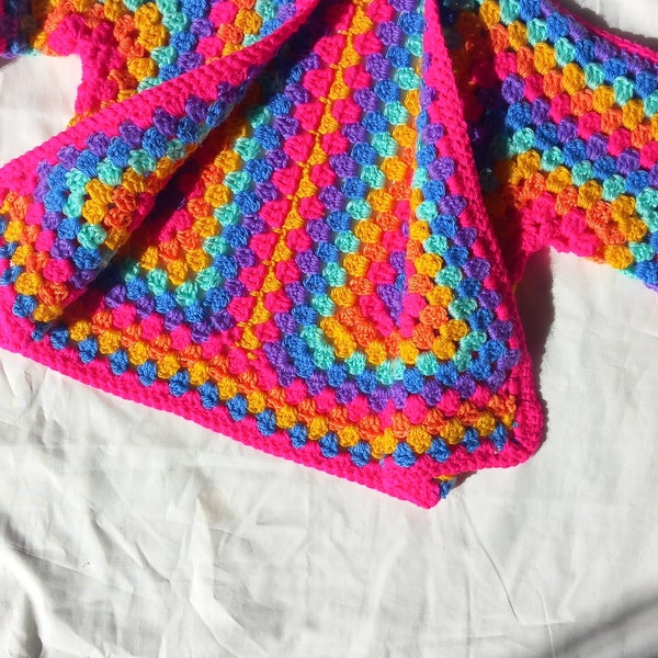 Handmade baby cardigan with pompom hat