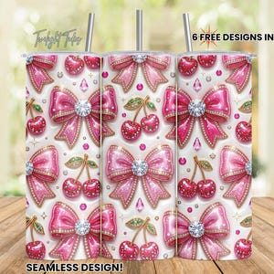 May include: A set of three stainless steel tumblers with a repeating pattern of pink bows, cherries, and diamond accents. The tumblers have silver straws and the text "6 FREE DESIGNS INCLUDED!" and "SEAMLESS DESIGN!"
