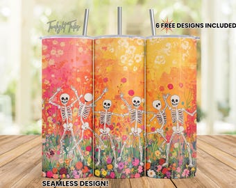 Könnte beinhalten: Drei Edelstahlbecher mit einem farbenfrohen Design, das Skelette zeigt, die in einem Blumenfeld tanzen. Der Hintergrund ist ein Farbverlauf von Orange, Gelb und Rosa. Die Becher haben ein Fassungsvermögen von 20 oz und ein nahtloses Design.