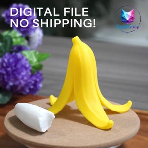 May include: A yellow banana peel figurine with a separate white banana fruit piece. The text DIGITAL FILE NO SHIPPING! is visible in the upper left corner, and a colorful geometric cat logo with the text ScribblePoly is in the upper right.