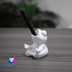 May include: A distressed wooden sign, reading "Welcome to our home" in white lettering. The sign has a rustic finish, ideal for adding a welcoming touch to a front door or hallway.