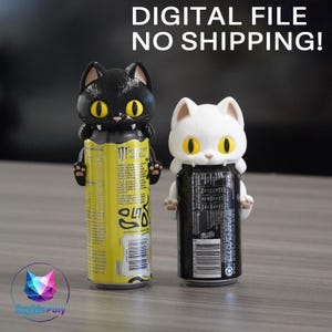 May include: Two cat-shaped can toppers, one black and one white, each featuring large yellow eyes and small fangs. The black cat sits atop a yellow beverage can, while the white cat sits on a black beverage can. Text reads DIGITAL FILE NO SHIPPING!