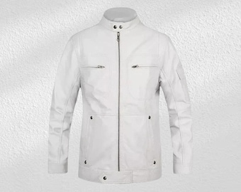 May include: A white leather jacket with a stand-up collar and a zip-up front. The jacket has two zippered chest pockets, two side pockets, and a small pocket on the left sleeve. The jacket has a tailored fit and a classic biker style.