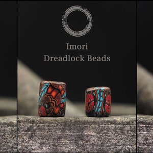May include: A set of colorful, patterned, rectangular dreadlock beads. The beads are made of polymer clay and have a variety of designs, including geometric patterns, floral motifs, and abstract shapes.