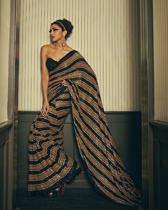 Party wear saree black and gold 2025