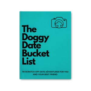 May include: A turquoise blue book with the title "The Doggy Date Bucket List" and a black and white illustration of a camera with a dog's head inside. The text "50 Scratch Off Date Adventures for You and Your Best Friend" is printed below the title.