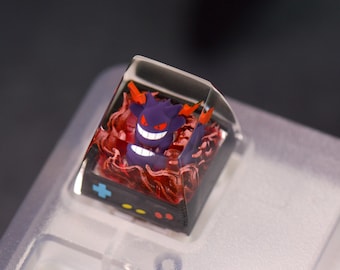 Chaveiro personalizado de alta qualidade, feito à mão, com o adorável Pokémon Gengar de Fogo. Item colecionável exclusivo com tema de animação. Ideal para presentear ou como brinquedo.