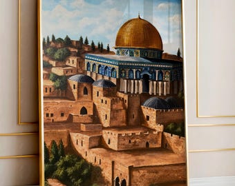 May include: A framed print of a Middle Eastern cityscape featuring a golden-domed building with blue accents. The artwork depicts a layered town with stone buildings, green trees, and a blue sky with clouds. The frame is gold.