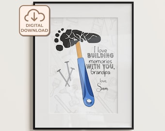 May include: A printable art print with a black footprint and a blue and orange hammer. The text reads "I love building memories with you, Grandpa. love, Sam."