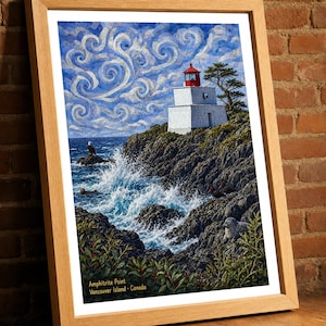 May include: A framed art print depicting the Amphitrite Point lighthouse on Vancouver Island, Canada. The scene features a white lighthouse with a red top, swirling blue sky, rocky cliffs, crashing ocean waves, a bald eagle, and a seal.