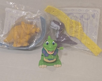 Giocattoli per bambini Burger King anni '90 Alla ricerca della Valle Incantata Dinosauri Menu Scrivibili a carica manuale