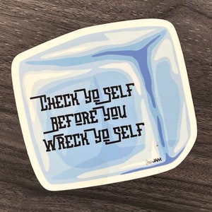May include: A sticker with a blue ice cube design and the text "Check Yo Self Before You Wreck Yo Self" in black block letters. The sticker has a white border and a signature in the bottom right corner.