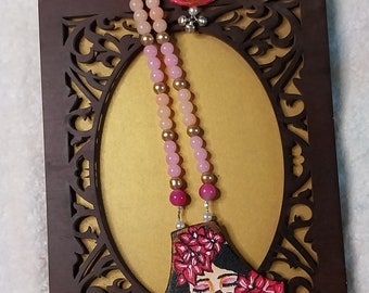 handpainted neckpiece on canvas