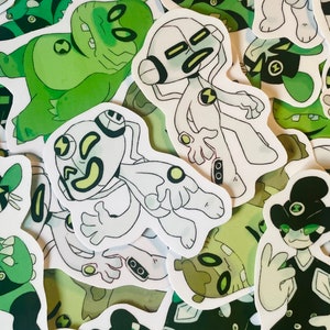 May include: A collection of colorful stickers featuring cartoon characters from the animated series Ben 10. The stickers are printed on white paper and feature various characters from the show, including Ben Tennyson,  Four Arms,  and  Diamondhead.