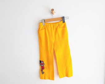 Pantalon en polyester Super Jump Up jaune soleil des années 70. 4/5.