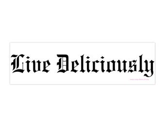 May include: Black and white graphic with the text "Live Deliciously" in a gothic font.