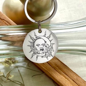 Celestial Sun and Moon Keychain - Stylish Lunar and Solar Accessory