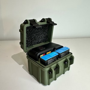 Custodia robusta/rotonda per GoPro 9/10/11/12. Diverse varianti di schede SD e numeri di batteria. Custodia GoPro
