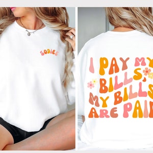 1000 Pound Sisters &quot;I Pay My Bills, My Bills Are Paid&quot; on back and &quot;Sodies&quot; Unisex Sweatshirt