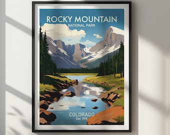 May include: A framed art print featuring a vintage-style illustration of Rocky Mountain National Park in Colorado. The artwork depicts a serene landscape with a river, mountains, and trees under a blue sky. The text "ROCKY MOUNTAIN NATIONAL PARK COLORADO Est. 1915" is displayed.