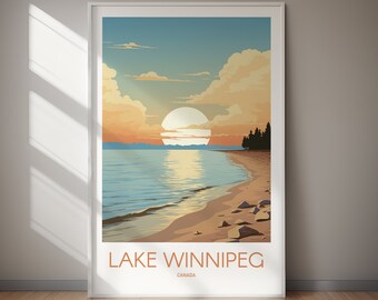 May include: A framed vertical wall art print featuring a sunset over Lake Winnipeg, Canada. The illustration depicts a sandy beach with scattered rocks, calm blue water, a large sun, and clouds in shades of orange and yellow, with text at the bottom.
