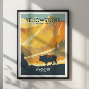 May include: A vintage-style poster with a yellow, orange, and blue color scheme depicting a mountain landscape with a bison in the foreground. The poster reads "Yellowstone National Park" and "Wyoming Est. 1872".