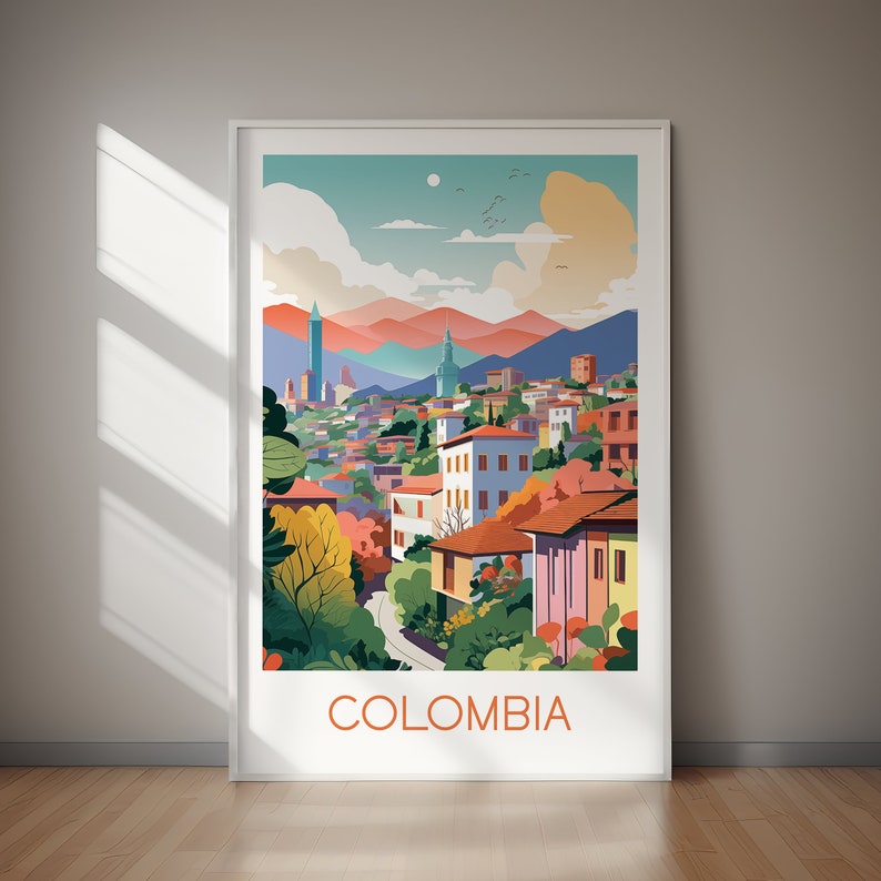 May include: A framed art print featuring a stylized illustration of a city in Colombia. The artwork showcases colorful buildings, lush greenery, and mountains under a pastel sky. The word "COLOMBIA" is printed at the bottom.