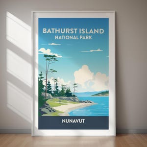May include: A framed poster featuring a scenic illustration of Bathurst Island National Park in Nunavut. The artwork depicts a coastal landscape with a blue sky, clouds, and a shoreline with trees. The poster has the text "Bathurst Island National Park" and "Nunavut".